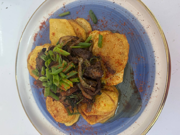 Fried potatoes with meat